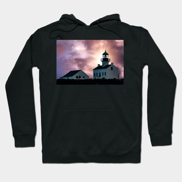 Sunset over a lighthouse Hoodie by Memories4you